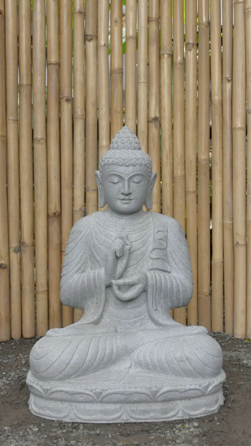  Product image 1 of the product “Seated Buddha made of Riverstone in Dharmachakra gesture of wheel of the teaching of the Dharma, H. 79cm. ”